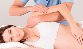 остеопат и беременная женщина
